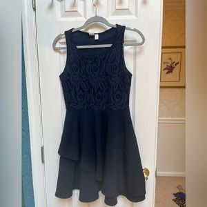 Francesca’s navy blue patterned dress